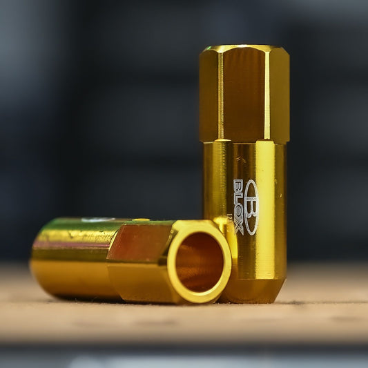 PT-59 TUERCA ALUMINIO LARGA DORADA 12X1.5