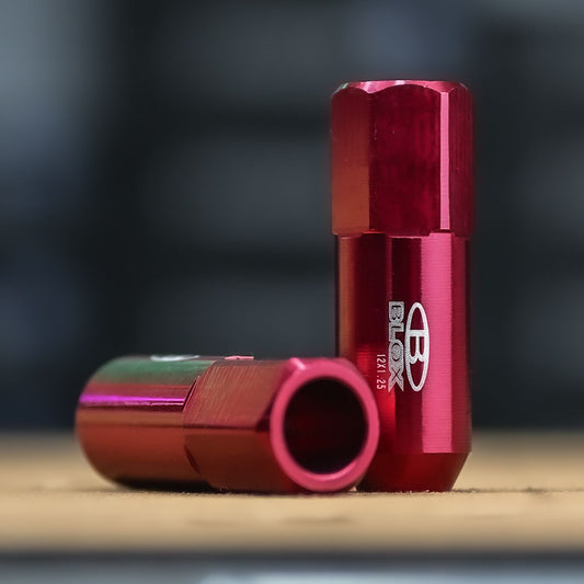 PT-60 TUERCA ALUMINIO LARGA ROJO 12X1.25