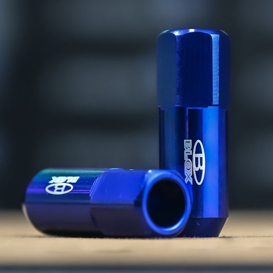 PT-62 TUERCA ALUMINIO LARGA AZUL 12X1.25